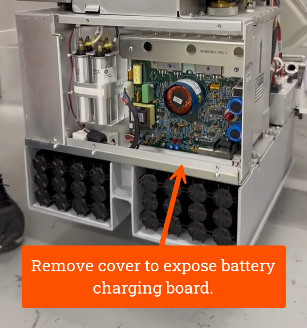 Remove cover to expose battery charging board